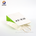 Bolsas de regalo de papel blanco con paneles laterales de color